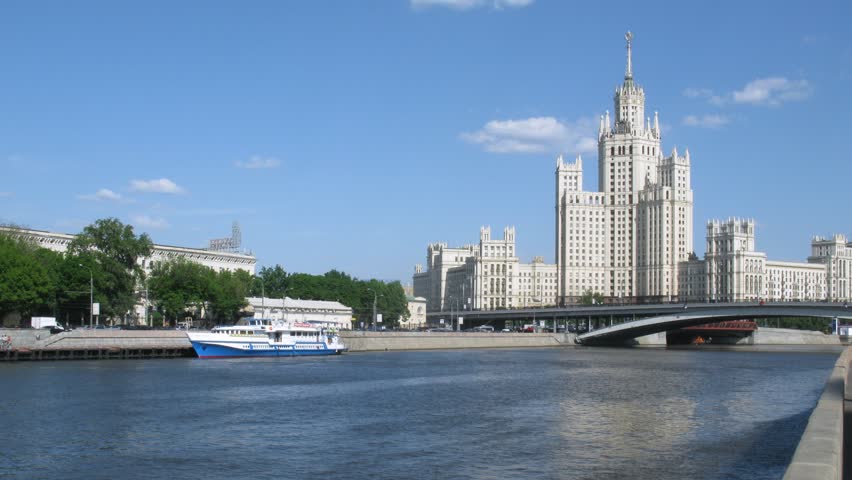 MOSCOW - JULY 5:  Bolshoy Ustinsky Bridge on Kotelnichesky quay, July 5, 2010 in Moscow, Russia. Bolshoy Ustinsky Bridge is a steel arch bridge that  connects the Boulevard Ring with Zamoskvorechye district in Moscow, Russia. 