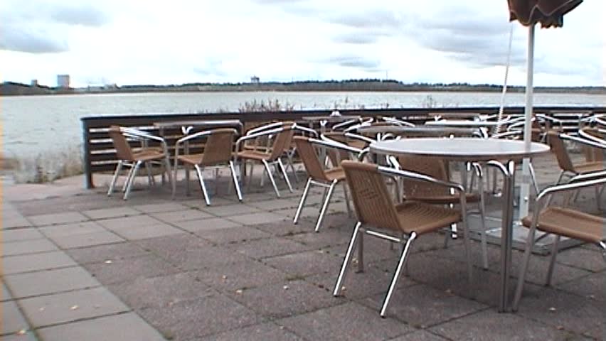 Empty cafeteria near the seashore, tripod, 16x9