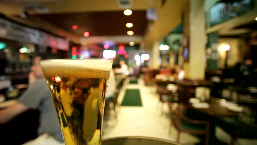 Beer traveling through a bar