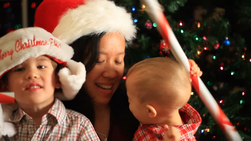 Family together at Christmas. Mom and sons.