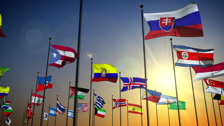 1080p stock video the Nations flags against the sky with camera panning by slowly