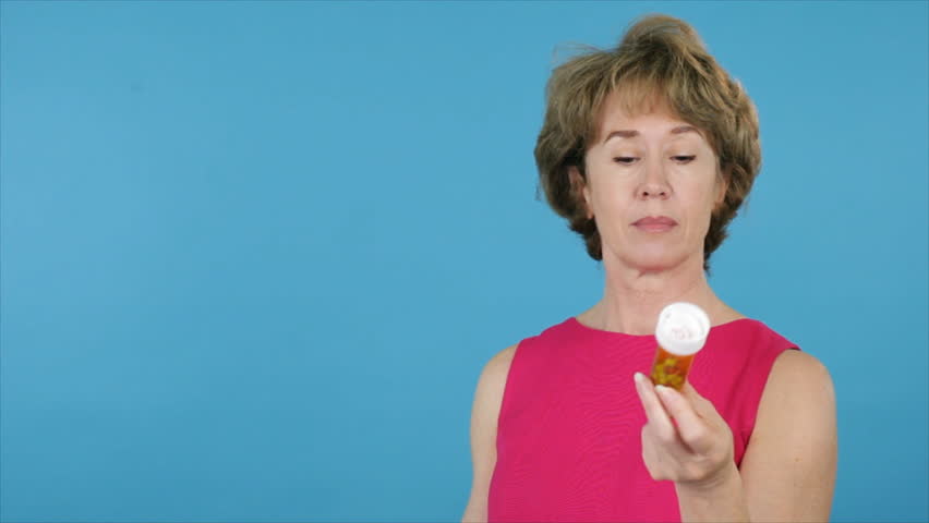 A woman makes a decision to go with a healthy diet as opposed to diet pills.