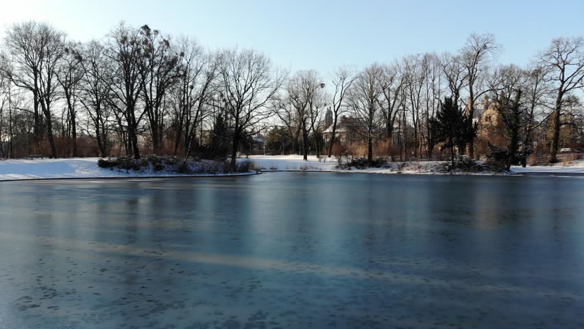 4k Aerial Drone Shot Of Frozen Pond In Grosser Garten Dresden Winter