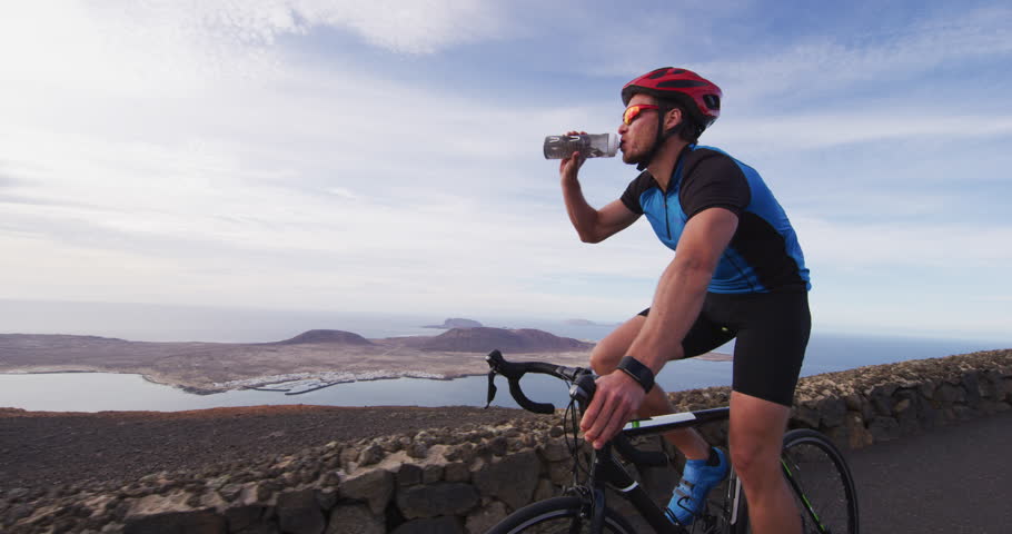 cyclist drinking water