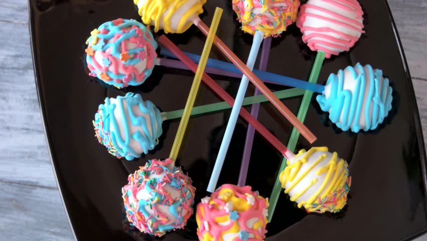 Video Stock A Tema Plate With Colorful Cake Pops 100 Royalty