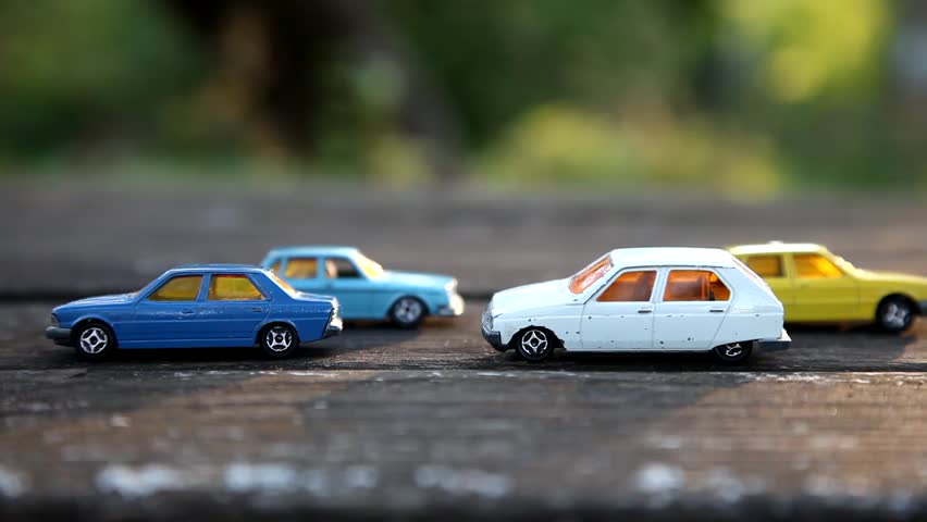 Toy Cars Car Models On Stock Footage 100 Royalty Free Toy Cars Car Models On Table In Summer Garden Sunset