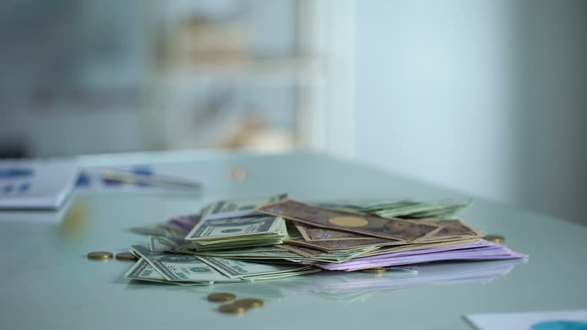 Money On Table Foreign Currency Stock Footage Video 100 Money On Table Foreign Currency Savings Bank Deposit Salary Earnings Cash