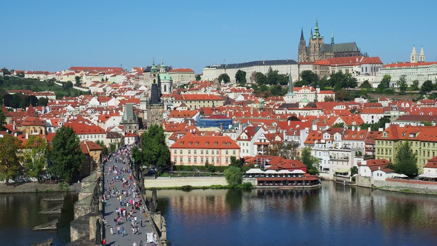 People on the bridge with cityscape in Prague, Czech Republic image