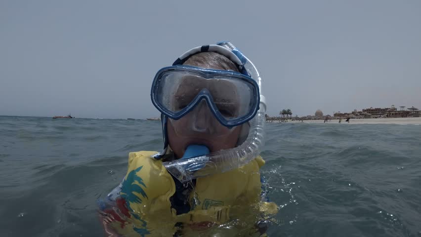 Image result for picture of kid in mask and swim fins