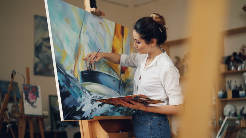 Skillful Female Painter is Working Stock Footage Video (100% Royalty