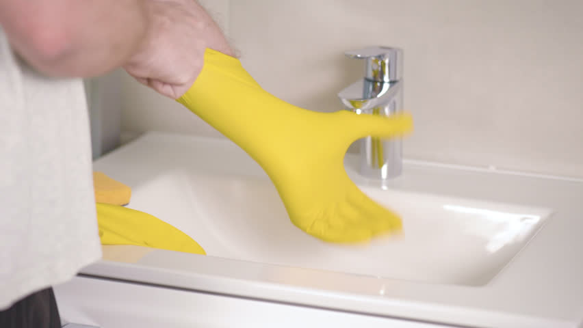 Hd00 30man Cleaning Bathroom Sink And Faucet With Detergent In