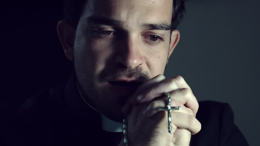 Young Priest Crying And Praying: Desperate Priest Searching For God ...