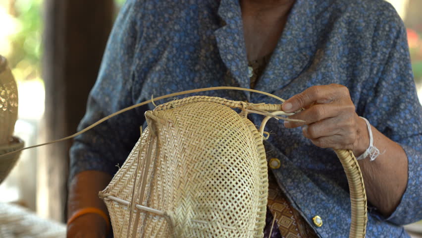 Hand Weaving a Bamboo Basket Stock Footage Video (100% Royalty-free