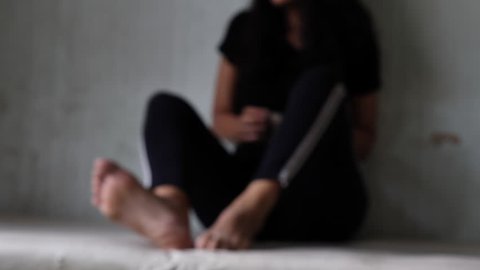 violence crime and kidnapping people concept, criminal tying woman hands with handcuffs - 4k.