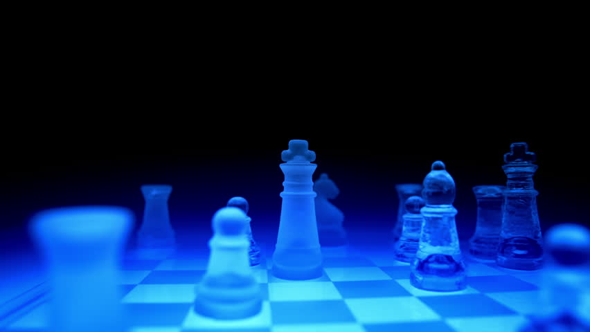 orbital-shot-playing-on-a-blue-futuristic-glass-chess-board-moving-the