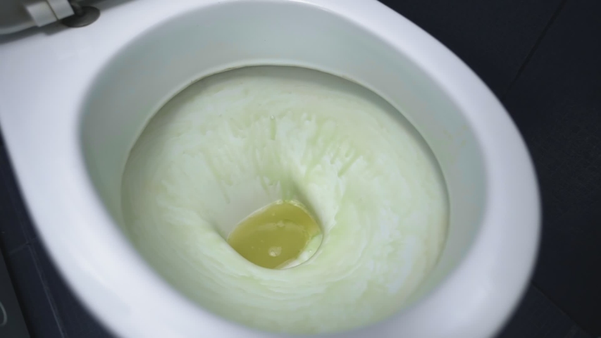 Water Running In Bowl Of Toilet