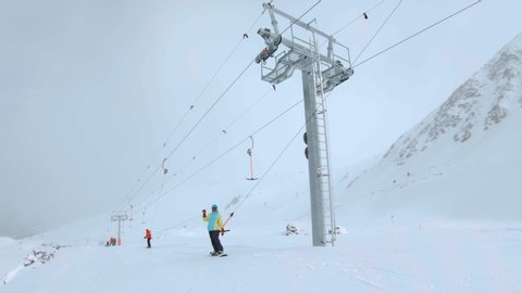 Бугельный подъемник сноуборд. Drag Lift. Drag Lift Skiing.