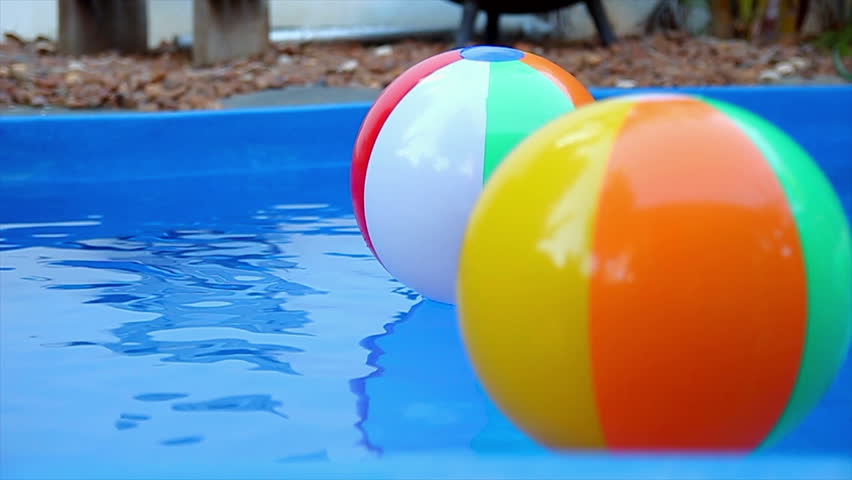 Pool Water With Beach Ball many colorful plastic toy balls floating in a children swimming Pool Water With Beach Ball many colorful plastic toy balls floating in a children swimming