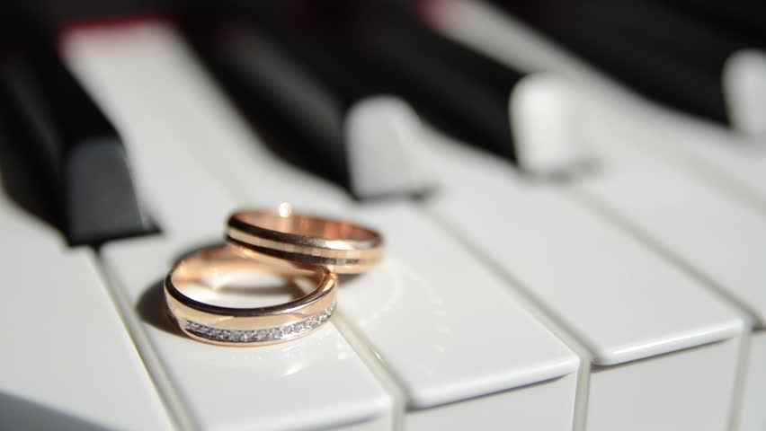 Piano And Wedding Rings Stock Footage Video 3650318 Shutterstock Wedding Rings On The Piano Hd Stock Footage Clip