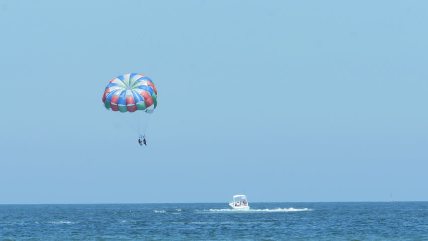 Parasailing From Boat In Ocean Stock Footage Video 100 Royalty Parasailing From Boat In Ocean At Virginia Beach