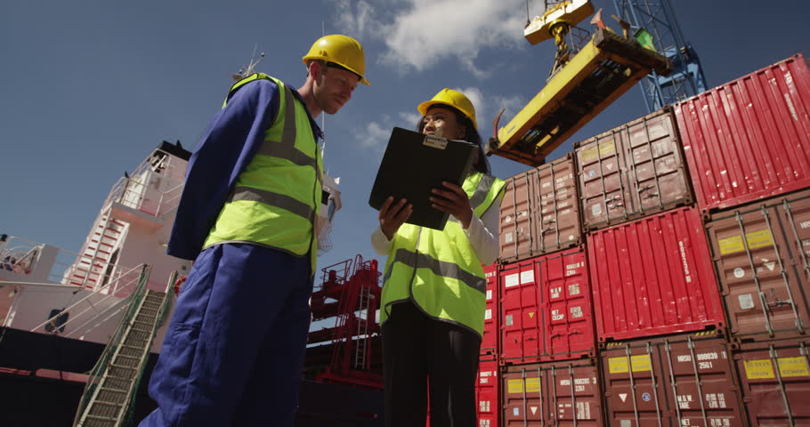 Businesswoman and Dock Worker Shake Stock Footage Video (100% Royalty ...