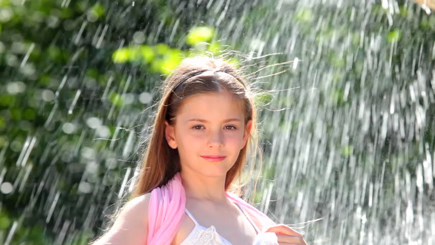 Little Girl And Water Drops Stock Footage Video 1202986 -7957