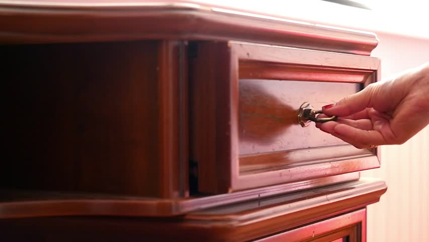 Women Hand Open Old Wooden Antique Chest Of Drawers With Metal