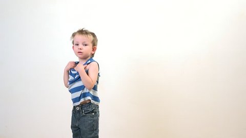 Funny Child Trying Take Off His Stock Footage Video (100% Royalty-free)  12674774 | Shutterstock