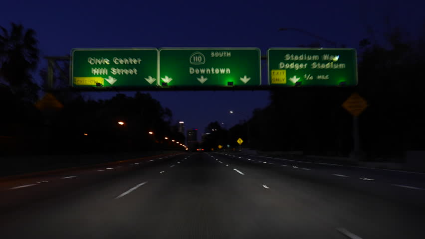 Beverly Hills, California - March 4, 2014: Traffic Passes In Night Time ...