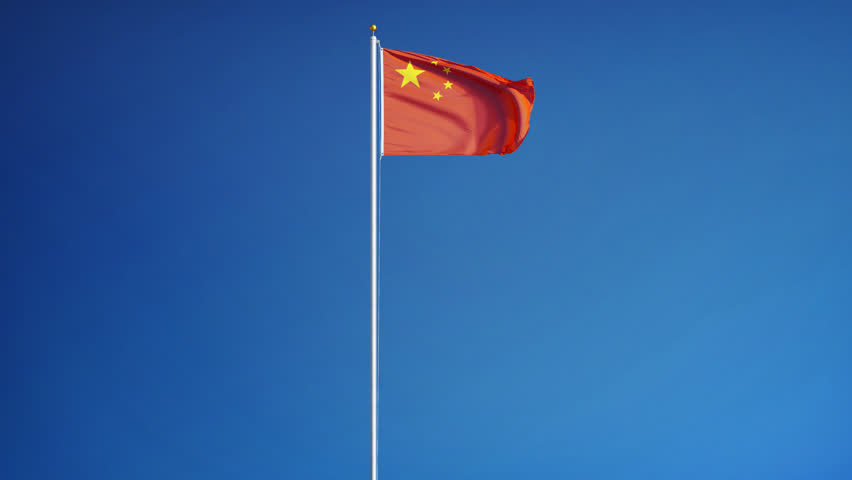 Chinese Flag On Flag Pole Blowing In Wind With Blue Sky Background ...