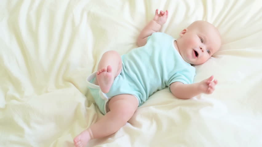 Baby Rolls Over In Bed Stockvideos Filmmaterial 100