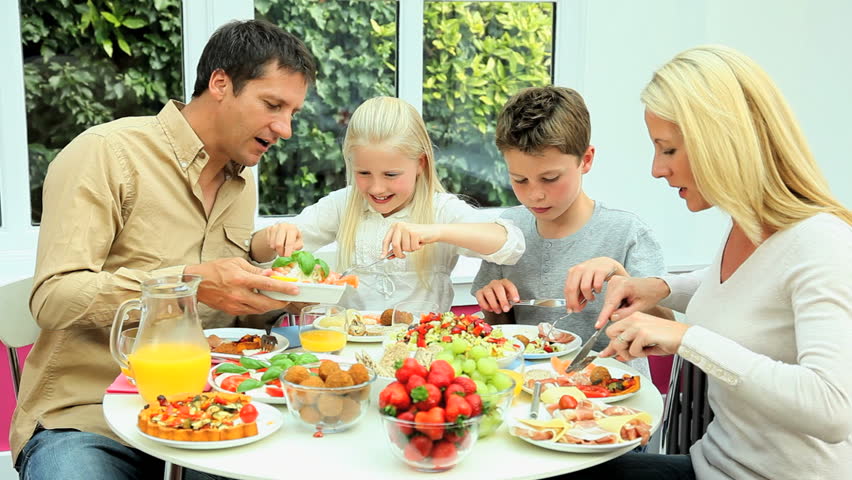 Young Caucasian Family Eating Healthy Stock Footage Video (100% Royalty