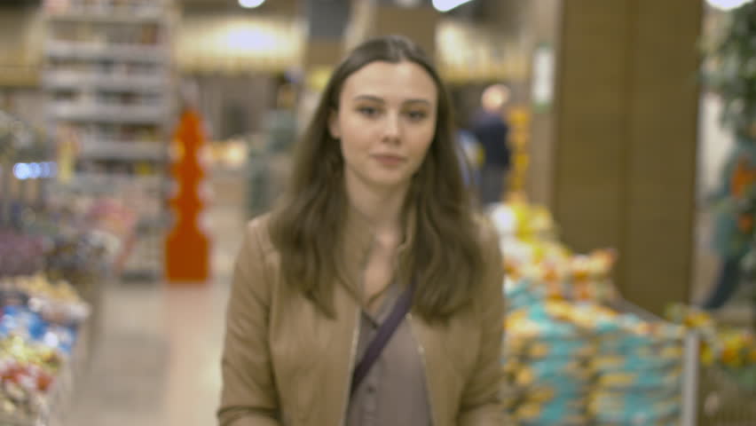 Sweet Young Woman Walking On The Supermarket Sweet Young Woman Walking On The Supermarket
