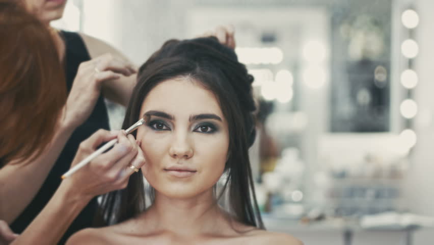 Professional Make Up And Hairstyles Artist Working On A Caucasian