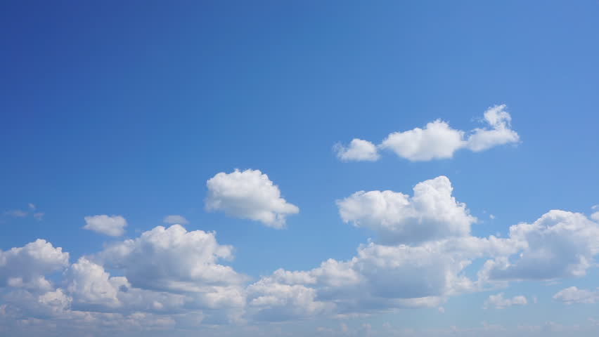 White Wispy Clouds Roll Across Deep Blue Summer Sky. Stock Footage ...