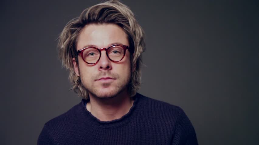 Young Man Wearing Glasses With Stockbeeldmateriaal En Video S