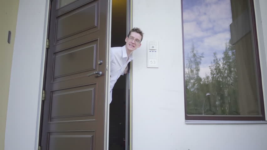 Hd00 10young Man Opening The Door Of His House And Inviting The