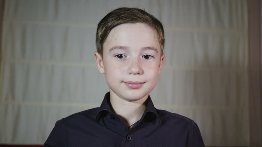 Closeup Portrait Of Cute Funny 10 Years Old Young Boy In 