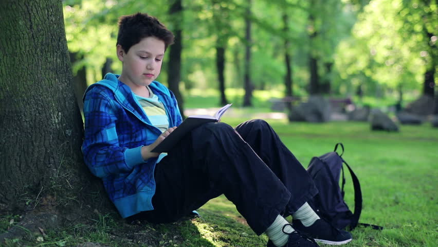 Young Boy Sitting By the Stock Footage Video (100% Royalty-free