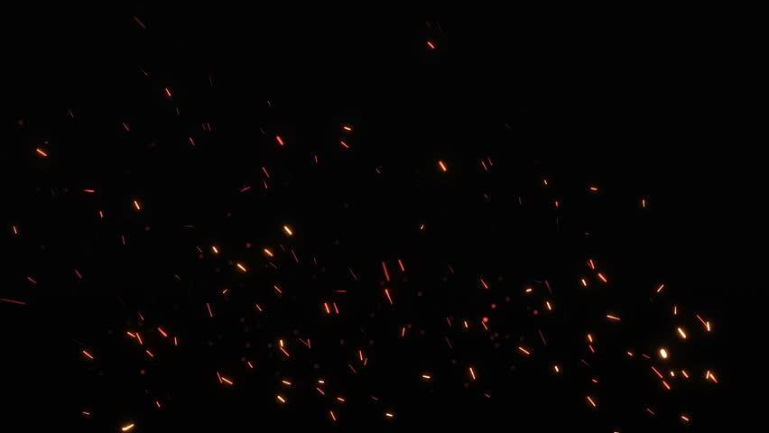 Real Fire Sparks Of A Bonfire Burning On A Black Background Stock ...