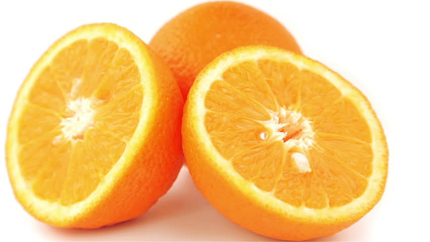 Half Orange Turning On Itself On A White Background Stock Footage Video ...