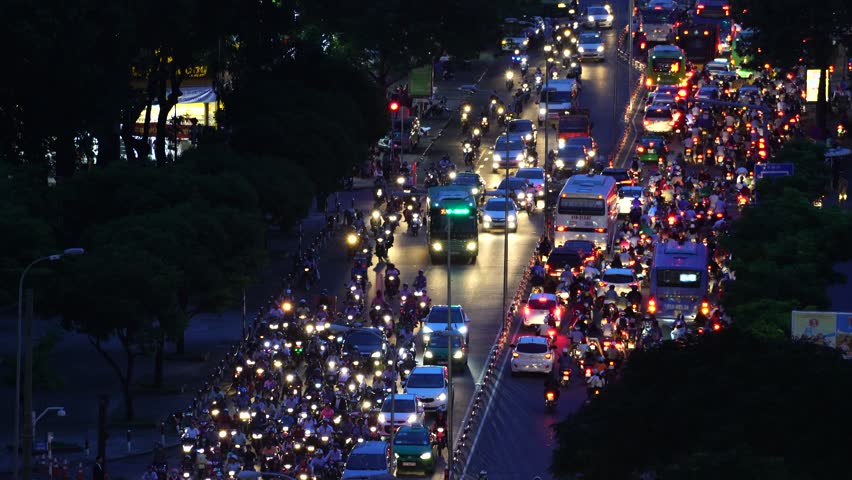 Ho Chi Minh City, Vietnam - April 2017 - Busy roads of Saigon, chaos on the street and above.