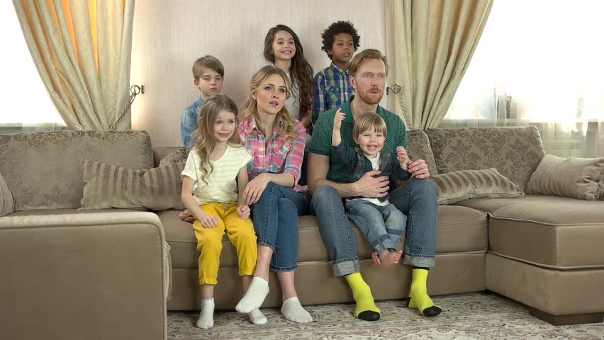 Hd00 15caucasian Family Watching Tv People Sitting In The Room