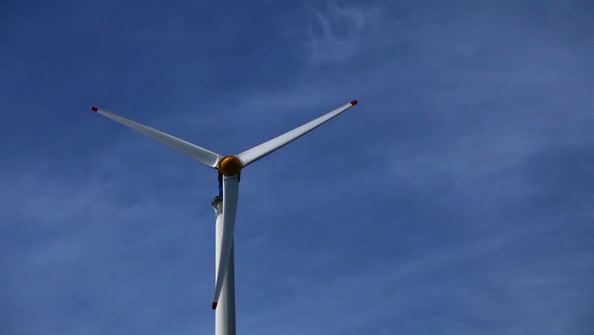 Single Blade Wind Turbine In Function And Plants Moving On A Windy Day ...