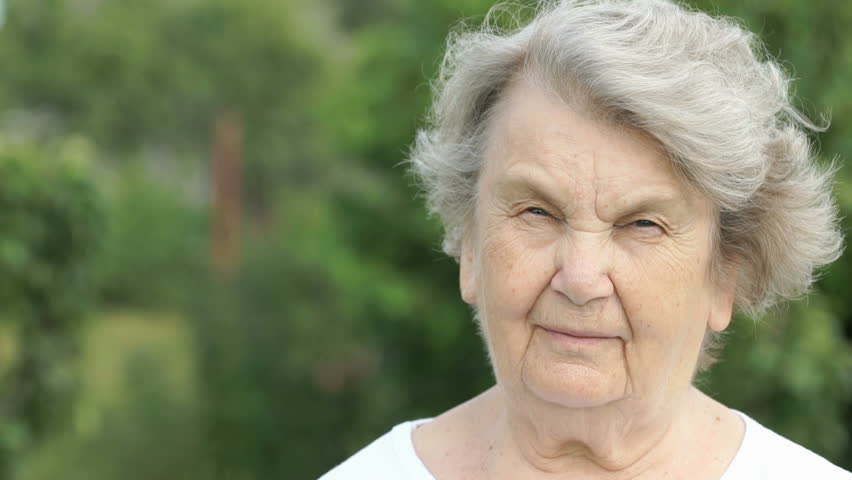 Portrait Of Smiling Mature Elderly Stockbeeldmateriaal En Video S