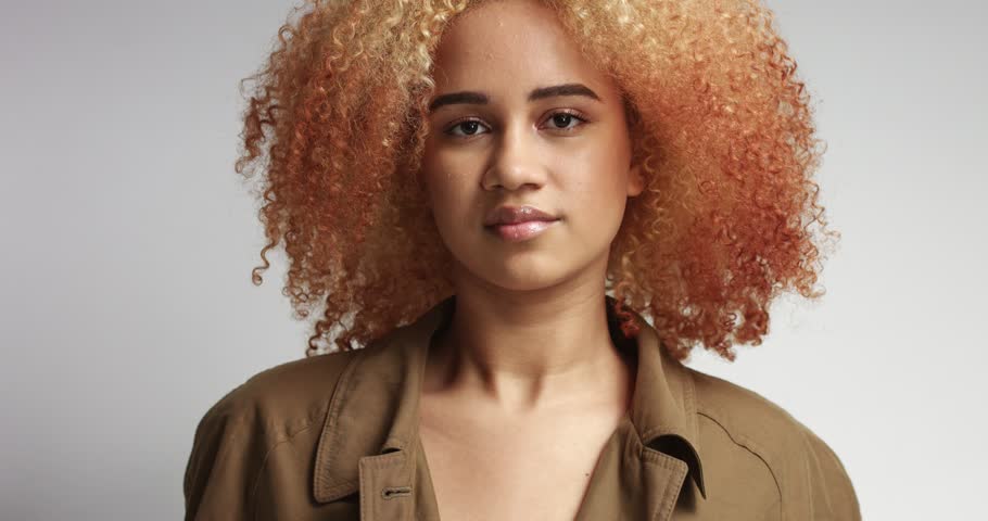 Sensual Flirty Young Mixed Race Female Model With Blond Red Afro