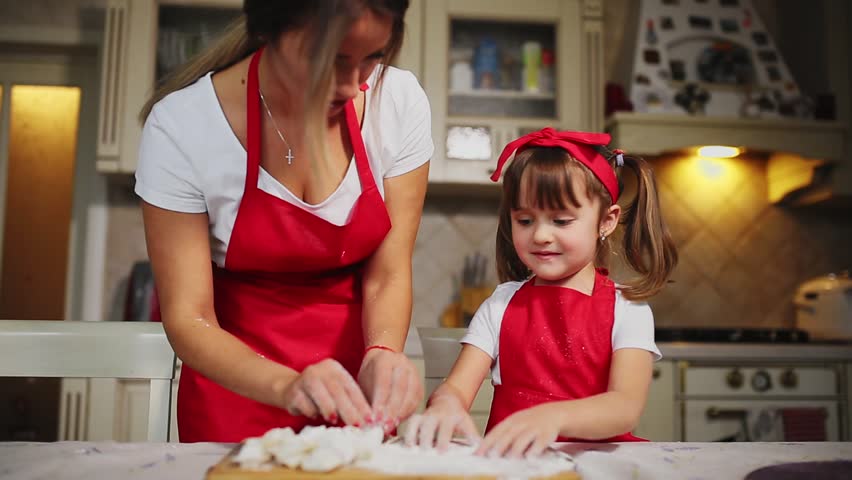 Mom Teaches Daughter To Cook Stock Video Footage 4k And Hd Video Clips Shutterstock