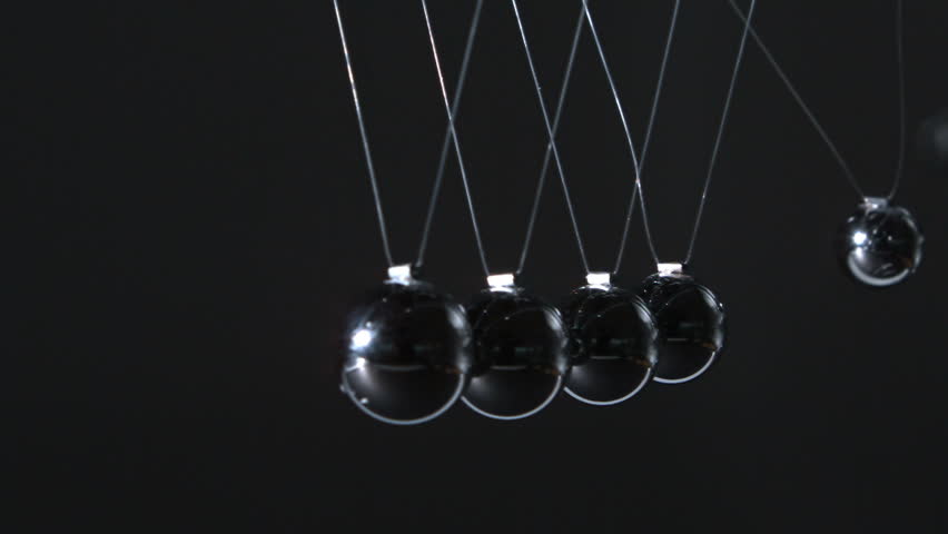 Stock Video Clip of Newtons cradle moving on black background in ...