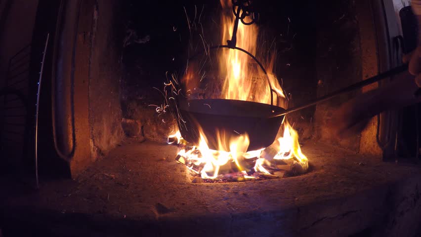 Cooking Roasted Chestnuts In The Pan On Fire In An Autumn Day