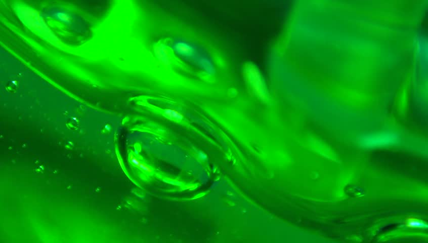 Extreme Macro Of Bubbles In Green Jello Cream (gel). Stock Footage ...